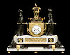 An important Louis XVI gilt and patinated bronze and white marble mantel clock of eight day duration representing Vestal Virgins Carrying the Sacred Fire, with movement by Pierre-Claude Raguet-Lépine